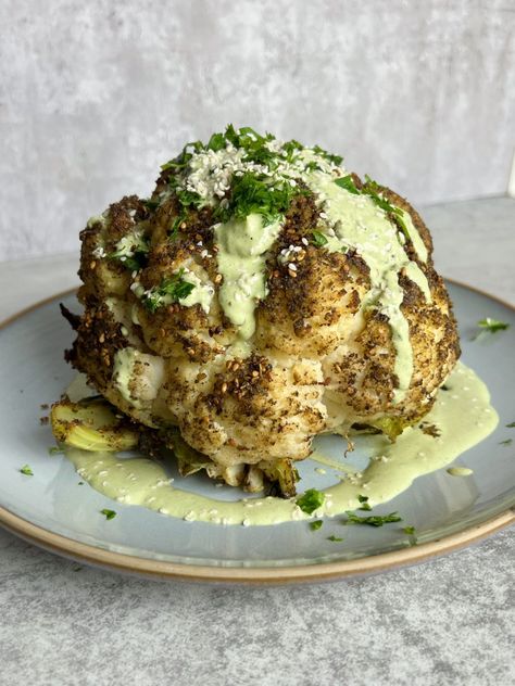 Za'atar Roasted Cauliflower - Something Nutritious Roasted Cauliflower Whole, Roasted Cauliflower Head, Grilled Cauliflower, Roasted Cauliflower Recipes, Drying Cilantro, Cauliflower Dishes, Whole Roasted Cauliflower, Za Atar, Tahini Sauce