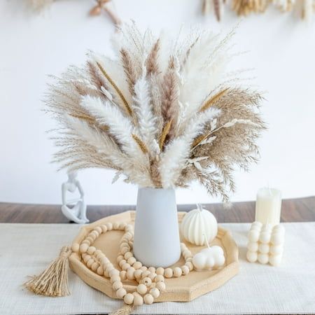 The timeless and classic look of pampas grass will never go out of style. Pampas grass is the sustainable and eco-friendly choice for those who want to add natural elements to their home. Bring nature home perfect for creating a cozy and inviting atmosphere. Size: 17".  Color: White. Pampas Grass Desk, Boho Wedding Table Arrangements, Pampas Grass Centerpiece Ideas, Thank You Decorations, Boho Party Centerpieces, Pampas Grass Centerpiece Table Settings, Easy Wedding Centerpieces Diy, Pampas Grass Baby Shower Decor, Boho Baby Shower Table Decor