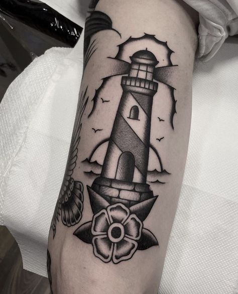 Light House Tattoo Old School, Nautical Elbow Tattoo, Trad Lighthouse Tattoo, Old School Tattoo Lighthouse, Old School Lighthouse Tattoo, Lighthouse Traditional Tattoo, Traditional Lighthouse Tattoo Design, Lighthouse Tattoo Traditional, Nautical Traditional Tattoo