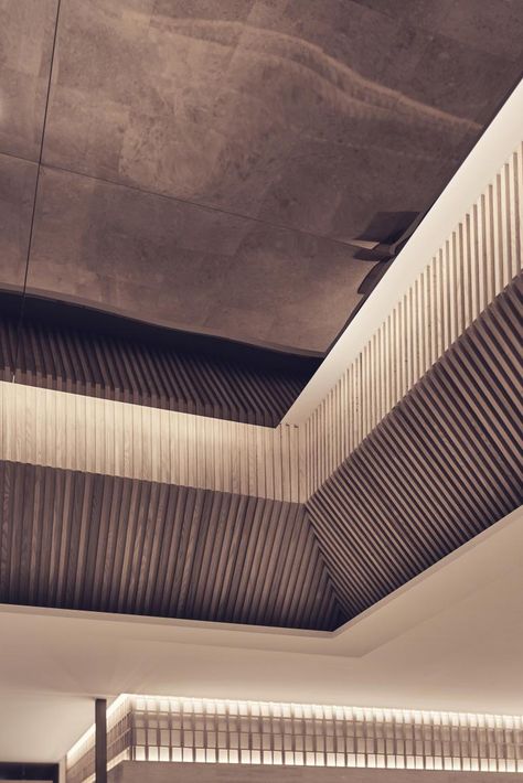 Minimalist architecture by the architecture studio of Teo Yang launches at the Gyeongju National Museum lobby and gallery in South Korea Minimalist Museum, Wood Slat Ceiling, Architecture Ceiling, Museum Design, Interior Ceiling Design, Gyeongju, Glass Display Case, Ceiling Design Modern, Ceiling Detail