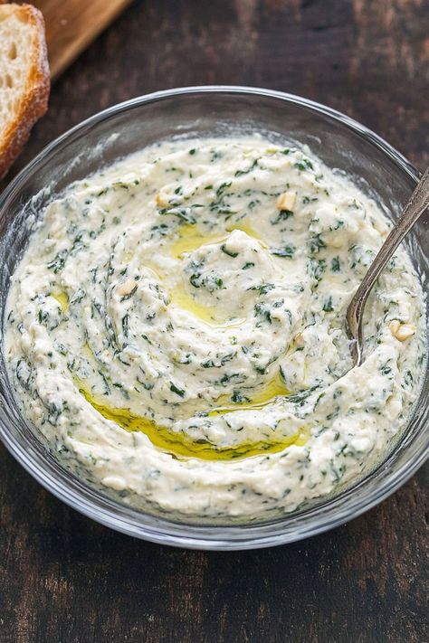 Indulge in a creamy and healthy snack with this flavorful Greek Yogurt Spinach Dip recipe. Packed with nutrients and delicious taste, this dip is perfect for parties or a light snack. The combination of tangy Greek yogurt with fresh spinach creates a rich and satisfying flavor profile that will please any palate. Quick and easy to make, this dip is a great option for those looking to eat more nutritious foods without sacrificing taste. Whipped Greek Yogurt Recipe, Yoghurt Dip Recipe, Dips With Greek Yogurt, Healthy Recipes With Greek Yogurt, Yogurt Spinach Dip, Whipped Greek Yogurt, Best Spinach Dip, Greek Yogurt Recipe, Best Greek Yogurt