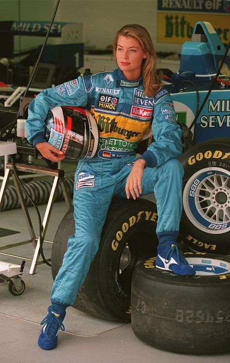 A MODEL POSES IN THE RACING OVERALLS OF REIGNING WORLD CHAMPION MICHAEL SCHUMACHER OF GERMANY AT THE INTERLAGOS CIRCUIT PRIOR TO THE 1995 BRAZILIAN Female Racer Aesthetic, Braxton Berrios, Female Race Car Driver, Female Racers, Car Outfit, Race Outfit, Hot Halloween Outfits, Outfit Retro, Formula Uno