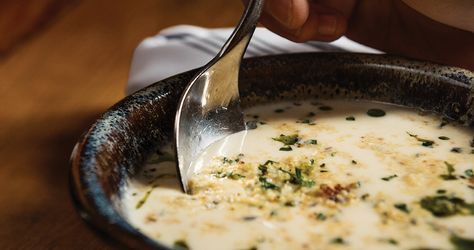 Asheville chef John Fleer may not have grown up eating buttermilk soup, but he has perfected the Appalachian taste over the years. Learn his recipe for the dish. Buttermilk Soup, State Recipes, Melting Pot Recipes, Appalachian Recipes, Spicy Grilled Shrimp, Chips Dip, Fondue Recipes Cheese, Buttermilk Cornbread, Chef John