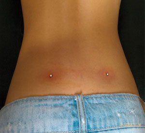 Lower back dermals. So cuteeee Piercing Lower Back, Lower Back Percinings, Lower Back Piercings, Dermals Back Dimples, Back Percinings, Lower Back Dermal Piercing, Lower Back Dermals, Back Dermal Piercing With Tramp Stamp, Back Dermal Piercing With Spine Tattoo