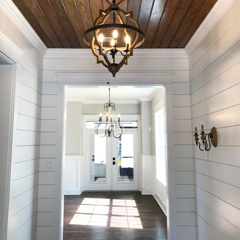 Jennifer Taylor Design - entry, shiplap, stained wood ceiling, modern farmhouse Farmhouse Foyer Lighting, Lighting Entryway, Farmhouse Foyer, Ship Lap, Foyer Lighting, Wood Ceiling, Unfinished Basement, Living Room End Tables, Painted Wood Signs