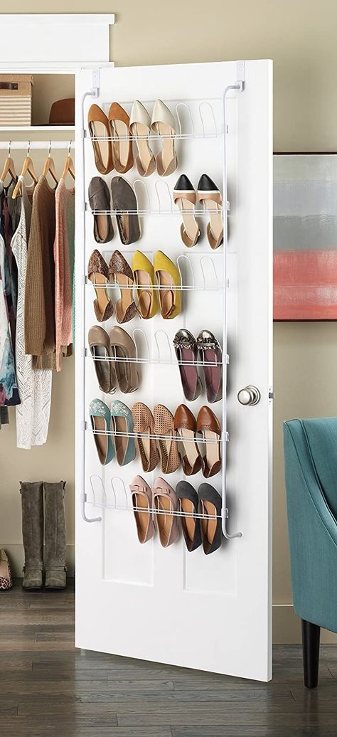 15 Shoe Storage Secrets Only the Pros Know | While the pros generally consider hanging shoes on the back of a closet as a last resort, in smaller closets, a door-mount shoe rack can be a real space-saver. If you’re looking to buy one, the pros agree that a metal rack makes for a sturdier solution. #declutter #organizationtips #realsimple #declutterideas #howtoclean #homeorganization Over Door Shoe Rack, Wooden Shoe Rack Designs, Door Shoe Rack, Hanging Shoe Rack, Diy Shoe Rack, Wooden Shoe Racks, Hanging Shoe Organizer, Door Shoe Organizer, Hanging Shoes