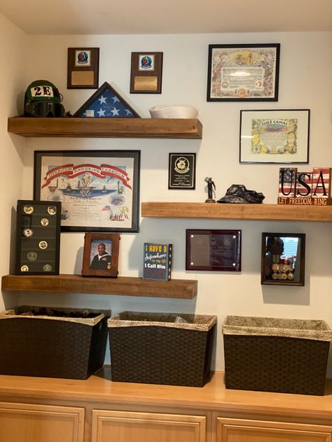 Wall Of Awards Ideas, Army Awards Display Wall, Air Force Office Decor, Army Wall Decor Ideas, Award Plaque Wall Display Ideas, Army Office Decor, Marine Corps Room Ideas, Veteran Shadow Box Ideas, Patriotic Office Decor