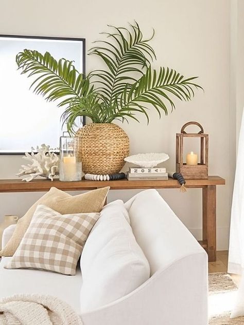 Styling a Console Table Like a Pro | How to Style Coastal Coastal Console, Small Coastal Living Room, Coastal Living Rooms Ideas, Coastal Design Interiors, Artificial Palm Leaves, Beach House Colors, Tabletop Shelf, Coastal Decorating Living Room, Coastal Style Decorating