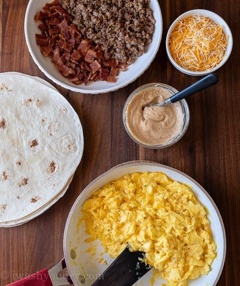 These Freezer Friendly Breakfast Burritos are stuffed with fluffy scrambled eggs, cheese, sausage or bacon and my favorite burrito sauce! Bacon Burrito Breakfast, Sauce For Breakfast Burritos, Breakfast Burrito Sauce Recipe, Breakfast Burrito Sauce, Burrito Sauce Recipe, Sausage Breakfast Burritos, Easy Breakfast Burrito Recipe, Freezer Friendly Breakfast, Burrito Sauce