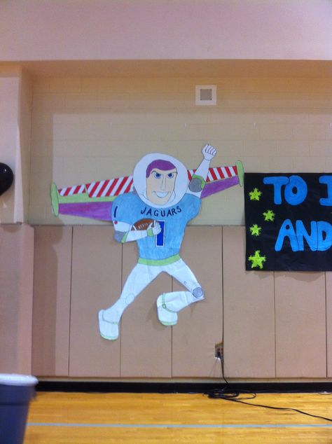 "To Infinity and Beyond" pep rally theme.  Buzz Lightyear dressed in a Johnson Jaguar's football jersey. Disney Pep Rally Ideas, Disney Pep Rally, Pep Rally Outfits, Pep Rally Themes, Stuco Ideas, Rally Ideas, Homecoming 2023, Rally Idea, Purple Floor