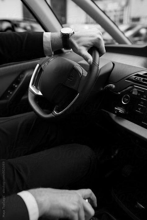 Business man in a suit driving a car by Maja Topčagić Men Driving Car, Men In Business Suits, Mens Business Aesthetic, Men Driving Aesthetic, Man Driving Aesthetic, Boss Men, Men Working Aesthetic, Man In Car Aesthetic, Man Driving Car