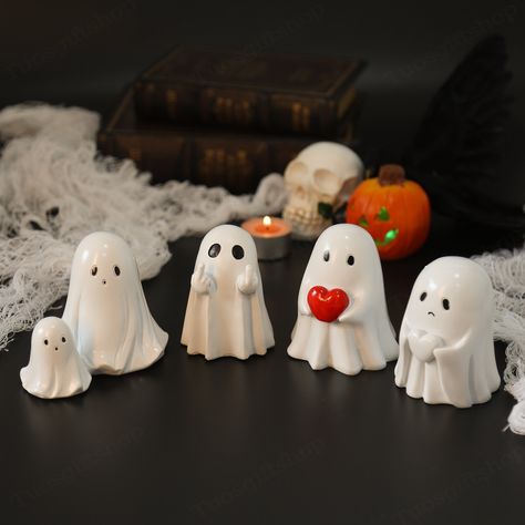 1. Product Detail: Material: Resin - **Charming Design The Cute Resin Ghost Figurine features four adorable styles, perfect for adding a whimsical touch to your Halloween decor or any space in your home or garden. - **Versatile Use Suitable for both indoor and outdoor placement, this Cute Resin Ghost Figurine can brighten up your desk, garden, or any area in need of festive flair. - **Gift-Ready Delight your friends and family by gifting this Cute Resin Ghost Figurine. It's an excellent choice f Ghost Clay, Desk Garden, Ghost Halloween Decor, Clay Ghost, Cheap Halloween Decorations, Halloween Figures, Halloween Clay, Cheap Halloween, Clay Diy Projects