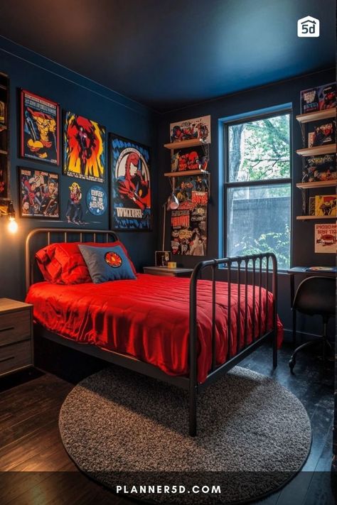 A comic-themed bedroom with dark blue walls, red bedding, and superhero wall art. Black And Red Boys Bedroom, Spider Man Room Ideas Kids, Red And Blue Boys Bedroom, Movie Themed Bedroom, Spider-man Room, Spiderman Themed Bedroom, Spiderman Room Ideas, Graphic Bedroom, Red Boys Bedroom