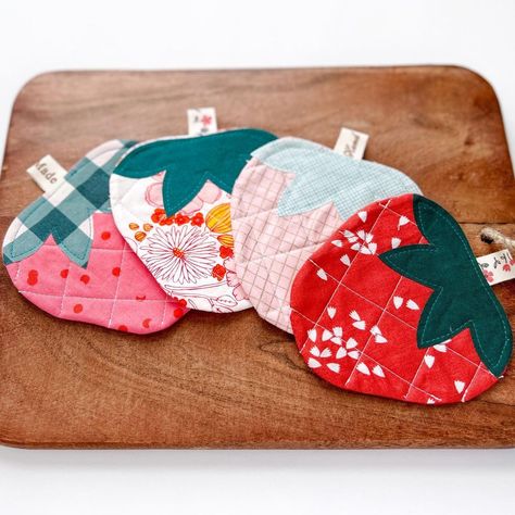 𝕄𝕖𝕘𝕒𝕟 | I made strawberry coasters for our guild gift exchange this weekend. 🍓 Although not exactly holiday themed, they did include both red and… | Instagram Sew Coasters Diy, Sew Coaster, How To Make Fabric Coasters, Christmas Sewing Coasters, Hand Sewn Fabric Coasters, Christmas Coasters Fabric, Apple Coasters Fabric, Fabric Coasters, Diy Coasters