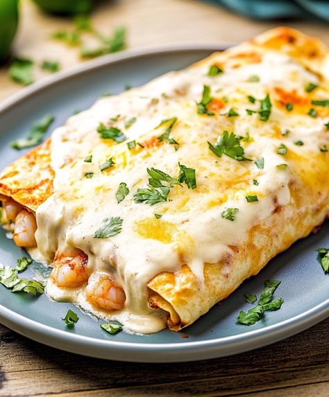 Creamy Shrimp Enchiladas Recipe Creamy Shrimp Enchiladas Recipe, Seafood Burrito Recipe, Shrimp Enchiladas With White Sauce, Crab Enchiladas Recipe, Crab Enchiladas, Creamy Shrimp Enchiladas, Shrimp Enchiladas Recipes, Seafood Enchiladas Recipe, White Sauce Enchiladas