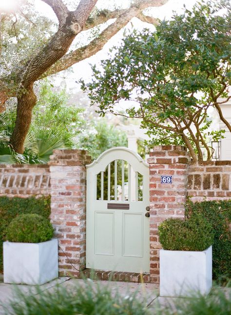 Ahh! The most gorgeous city on the coast of Carolina. As a Charleston SC Photographer I revel in every chance I get to be in this beautiful city. On a recent trip to Charleston, we meandered through the French Quarter and down Chalmers Street. Capturing some of the most quintessential things about Charleston, like the cobblestone streets, flower boxes under the windows, and horse-drawn carriage tours that you can spot throughout the city. Garden Gates And Fencing, Yard Gate, Garden Gate Design, Brick Fence, Garden Entrance, The French Quarter, Front Gates, Outside Living, Entrance Gates