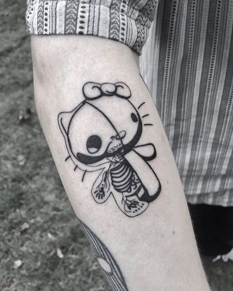 25 Kawaii Hello Kitty Tattoos That Kill With Centipede Tattoo Hello Kitty, Edgy Hello Kitty Tattoo, Hello Kitty Skull Tattoo, Dark Hello Kitty Tattoo, Hello Kitty Skeleton Tattoo, Scary Hello Kitty Tattoo, Creepy Hello Kitty Tattoo, Gothic Hello Kitty Tattoo, Hello Kitty Centipede Tattoo