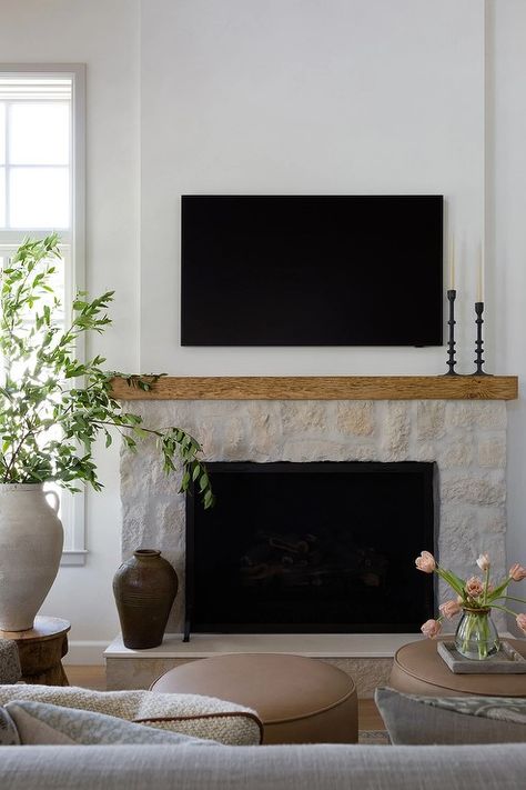 Rustic Cream Stone Fireplace with TV - Cottage - Living Room Cream Stone Fireplace, Stone Fireplace With Tv, Cream Fireplace, Above Fireplace Ideas, Fireplace With Tv, Cottage Style Living Room, Tv Above Fireplace, Above Fireplace, Black Candlesticks