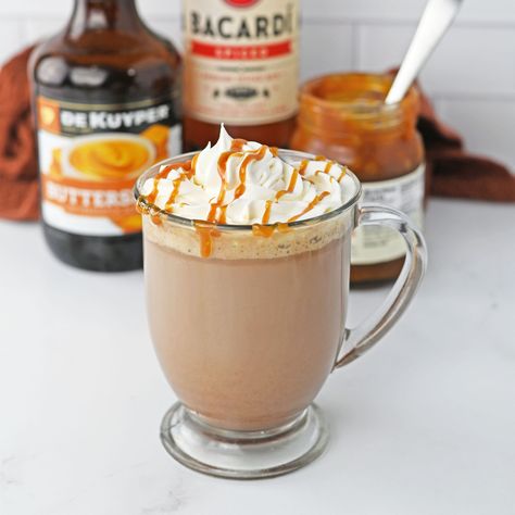 This Butterscotch Schnapps Hot Chocolate is a delicious, spiked hot chocolate recipe made with butterscotch schnapps and spiced rum! Butterscotch Snaps Drinks, Butterscotch Liquor Drinks, Butterscotch Hot Chocolate, Drinks Made With Butterscotch Schnapps, Butterscotch Schnapps Drinks Recipes, Butterscotch Hot Buttered Rum, Kahlua Hot Chocolate, Spiked Hot Chocolate Recipe, Hot Buttered Rum Recipe