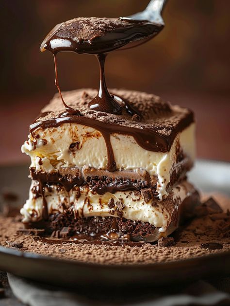 Chocolate Tiramisu 😋🍫    Ingredients 💯  - 2 cups heavy cream - 1/2 cup powdered sugar - 2 teaspoons vanilla extract - 16 ounces mascarpone cheese, softened - 2 cups semisweet chocolate chips, melted and cooled slightly - 2 cups brewed coffee or espresso, cooled - 1/4 cup coffee liqueur (optional) - 48-60 ladyfinger cookies (depending on the size of your dish) - Cocoa powder, for dusting Instructions⤵️  🥯Whip the Cream 🤍    - In a large mixing bowl, beat the heavy cream, powdered sugar, Chocolate Chip Tiramisu, Tiramisu Cups Recipe, Professional Baker Aesthetic, Chocolate Layer Dessert, Tiramisu Cups, Chocolate Tiramisu, Luxurious Chocolate, Dessert Recipies, Coffee Liqueur