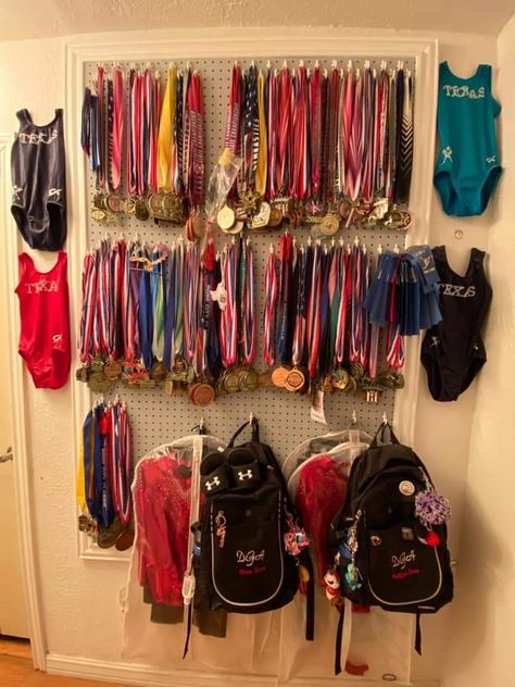 Display wall ideas for gymnastics medals. Display Wall Ideas, Gymnastics Medal Display, Gymnastics Wallpaper, Gymnastics Medals, Swimming Jokes, Swimming Medals, Swimming Funny, Swimming Photos, Swimming Motivation