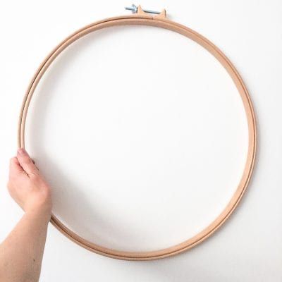 10 alternative ideas for using embroidery hoops | Studio Koekoek Decorate Embroidery Hoop, How To Hang Embroidery Hoop On Wall, Embroidery Hoop Orbs Diy, Holla Hoop Picture Frame, Hang Embroidery Hoop On Wall, Macrame Rug, Large Embroidery Hoop, Quilting Hoops, Cross Stitch Hoop