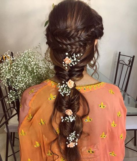 Indian bridal hairstyles inspiration | Bubble fishtail braid adorned with flowers | Mehendi hairstyles | Mehendi look inspiration for Indian brides | Hairstyle ideas | Fresh flower hairstyles | Credits: Ritika Hairstylist | Every Indian bride’s Fav. Wedding E-magazine to read. Here for any marriage advice you need | www.wittyvows.com shares things no one tells brides, covers real weddings, ideas, inspirations, design trends and the right vendors, candid photographers etc. Engagement Hairstyles, Bridal Hairdo, Indian Wedding Hairstyles, Indian Bride Hairstyle, Indian Bridal Hairstyles, Different Hairstyles, Fish Tail Braid, Indian Hairstyles, Bride Hairstyles