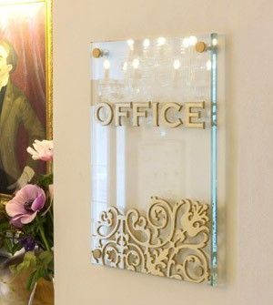 Glass name plate designs to give your home a spiritual and sophisticated touch | Housing News Glass Name Plates For Home, Acrylic Signage Design, Gold Signage, Laser Cut Signage, Glass Signage, Room Signage, Medical Office Decor, Name Plates For Home, Name Plate Design