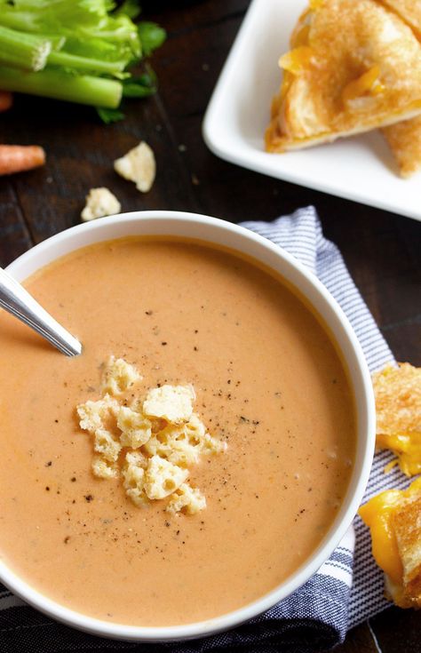 This Creamy Tomato Bisque recipe is amazing! It's simple to make, loaded with veggies and is absolutely delicious! Serve it with grilled cheese. Creamy Tomato Bisque Soup, Creamy Tomato Bisque, Tomato Bisque Recipe, Slow Cooker Turkey Chili, Cheese And Tomato, Caramel Chocolate Chip Cookies, Delicious Veggies, Bisque Recipe, Tomato Bisque