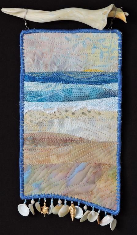 Everyday at the Beach is Different #3. Small fiber art quilt by Eileen Williams. It is hanging from found a shell fragment. Seascape Quilts, Tropical Quilts, Ocean Quilt, Textile Collage, Beach Quilt, Sea Quilt, Landscape Art Quilts, Hanging Quilts, Landscape Quilt