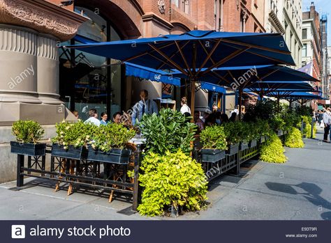 Download this stock image: New York, NY 18 Oct 1014 - Lafayette sidewalk cafe in Noho - E93T9R from Alamy's library of millions of high resolution stock photos, illustrations and vectors. Sidewalk Cafe Design, Terace Design, Irish Pub Decor, Exterior Planter, Rooftop Restaurant Design, Restaurants Outdoor Seating, Restaurant Outdoor, Cafe New York, Parisian Bistro