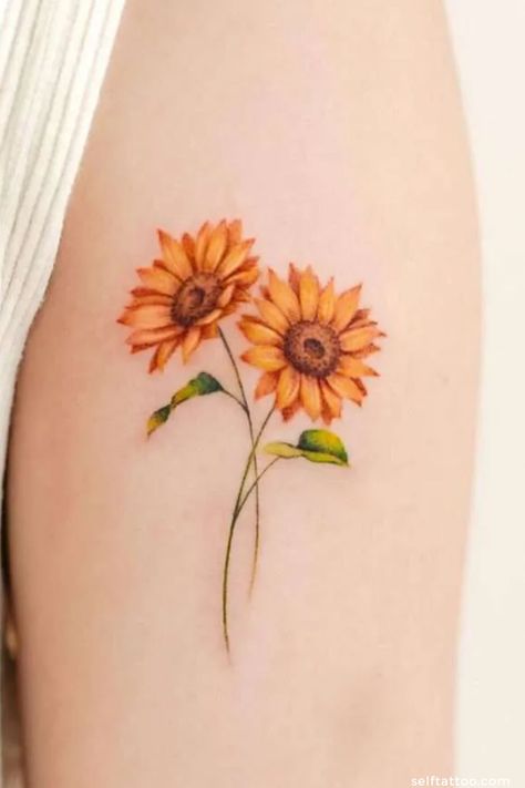 Unveil the meaning behind sunflower tattoos and find your perfect ink inspiration with our collection of ideas. From shoulder to sleeve designs, explore colorful and minimalist options for women. Dive into our article for small and simple fine line tattoos that capture the essence of these radiant flowers. Sunflower Arm Tattoo, Yellow Tattoo Ink, Self Tattoo, Sunflower Tattoo Simple, Green Tattoos, Favorite Tattoos, Saved Tattoo, Floral Tattoos, Fresh Tattoo