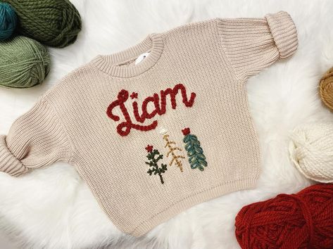 Our #1 Seller of all will remain on sale throughout the month of July, along with all Christmas designs. Snag yours at a discount while you can. These will not be marked down after this month☺️🌲❤️ #themodmango #themodmangobabyco #babychristmassweater #babysfirstchristmas #babysweater #babysweaters #christmasinjuly #custombabysweater #babyboutique #personalizedbabygift Holiday Party Pictures, Name Sweater, Knit Baby Sweaters, Embroidery Sweater, Toddler Sweater, Baby Co, Baby Sweater, Toddler Christmas, Tree Pattern