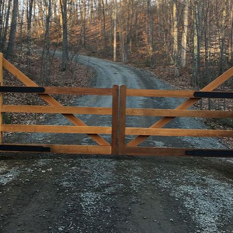 Tri State Gate installed this rustic cedar entry gate on a ranch property in New York. Although the design is farm/ranch style, this driveway gate is automated and features a secure keypad entry since we couldn't install automatic sensors due to the seasonal ground freeze. Designed and installed by Tri State Gate in Bedford Hills, New York. Culvert Driveway, Wooded Driveway, Ranch Driveway, Wood Driveway Gate, Wood Driveway, Farm Gates Entrance, Wooden Driveway Gates, Entrance Gates Driveway, Wood Gates Driveway