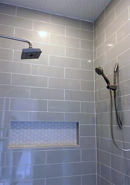 Magnificent Shower Niche Design Ideas Grey Subway With White Hexagon Small Tiles Makeover Kamar Mandi, Subway Tile Showers, Shower Wall Tile, Shower Niche, Bathroom Shower Tile, Shower Tile Designs, Basement Bathroom, Bathroom Redo, Shower Remodel