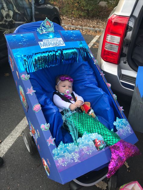 DIY Little Mermaid baby stroller Halloween Costume Mermaid Stroller Costume, Little Mermaid Baby Costume, Baby Ariel Costume, Halloween Stroller Ideas, Stroller Costumes For Babies, Baby Stroller Costume, Stroller Halloween, Stroller Halloween Costumes, Baby Mermaid Costume