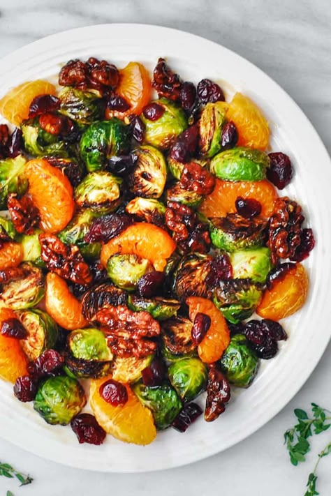 mandarin orange salad with dried cranberries, walnuts, roasted Brussels sprouts, and balsamic glaze on a white plate Salad With Mandarin Oranges, Mandarin Salad, Balsamic Brussel Sprouts, Mandarin Orange Salad, Fall Salads, Fall Salad, Easy Salad Dressing, The Recipe Critic, Beautiful Salad