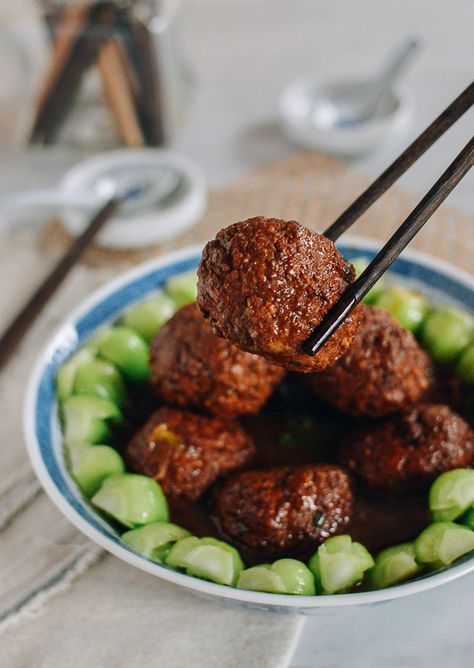 Lion's Head Meatballs is a classic Chinese celebration dish. Our recipe is succulent and flavorful, braised in a rich sauce and served with blanched greens. Source: thewoksoflife.com Chinese Meatballs, Chinese New Year Recipes, New Year Recipes, Wok Of Life, Woks Of Life, The Woks Of Life, Chinese Recipe, Authentic Chinese Recipes, Mapo Tofu