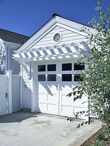 Love the trellis over the garage and the garage doors. Door Pergola, White Garage, Garage Pergola, Pergola Diy, Garage Door Types, Garage Door Styles, Garage Exterior, Carriage Doors, Faux Window