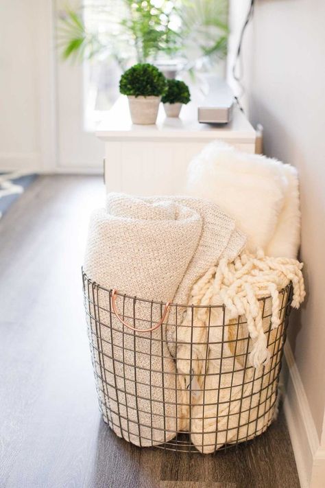 Blanket storage doesn't have to be an afterthought. From a repurposed drying rack to a DIY ladder, here are several attractive storage solutions for blankets. Atlanta Apartments, College Apartment Living Room, Decor Ikea, College Apartment Decor, Apartment Tour, College Apartment, Decoration Inspiration, Affordable Home Decor, Apartment Living Room