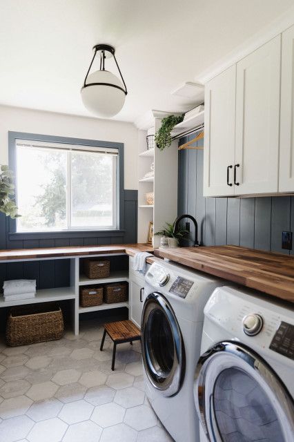 Before and After: Laundry Room Gets a Moody Blue Makeover Laundry Room With Navy Washer And Dryer, Charcoal Laundry Room, Office And Laundry Room Combo, Office Laundry Room Combo, Laundry Office Combo, Laundry Room And Office Combo, Laundry Room Office Combo, Navy Blue Laundry Room, Laundry Room Pantry Combo