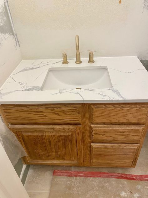 Natural Oak Cabinets Bathroom, Honey Oak Bathroom Vanity Makeover, Paint Oak Bathroom Cabinets, Brass And Wood Bathroom, Bathroom Ideas With Oak Cabinets, Neutral Bathroom Vanity Paint Colors, Tan Bathroom Countertop, Oak Vanity Bathroom Ideas, 90s Oak Cabinets