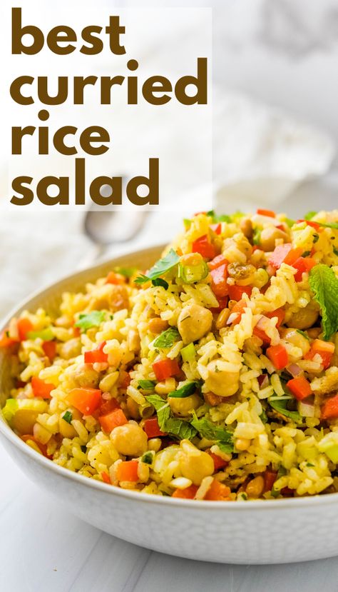 This quick and easy rice salad recipe is great for summer cookouts and potlucks. Loaded with fresh veggies like bell peppers, green onions and garbanzo beans, it's the homemade curry dressing that makes this vegetarian, gluten free side dish special. The honey dijon vinaigrette with turmeric, curry powder and fresh herbs like parsley and mint is lip smacking good. #ricesalad #sidedish Curried Rice Salad Recipes, Rice Salad Dressing, Rice Salad Cold, Salads For Summer, Curried Rice Salad, Curried Rice, Curry Dressing, Rice Salads, Ginger Vinaigrette