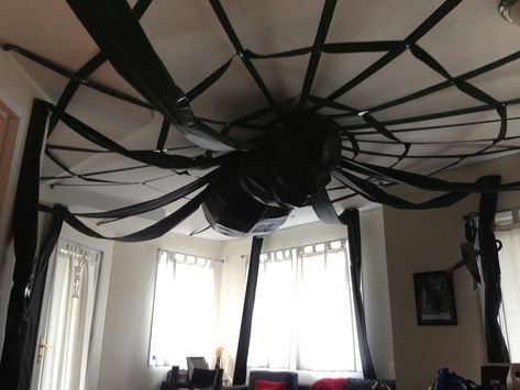 Giant spider Halloween party decoration | Manning Makes Stuff Halloween Ceiling Fan, Halloween Office Ideas, Halloween Ceiling Decorations, Halloween Ceiling, Ceiling Paper, Huge Spiders, Halloween Office, Spider Decorations, Halloween Party Decoration