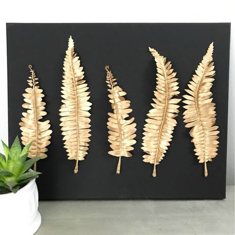 How to create your own metal leaf wall art at a fraction of the cost. A project inspired by the metal leaf home decor at Target. Metal Leaf Wall Art, Diy Sunglasses, Face Ideas, Painting Face, Sunglasses Storage, Dollar Store Diy Projects, Festival Essentials, Inexpensive Home Decor, European Home Decor