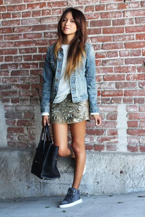 Click for cute ways to wear a sequin skirt this holiday party season. One of our favorites? Wear a white tee and denim jacket like Sincerely Jules. Sequin Mini Skirt Outfit, High Top Outfit, Sneaker Outfit Fall, How To Wear Denim Jacket, Sequin Skirt Outfit, Skirt Outfit Casual, Gold Sequin Skirt, Skirt Styling, Shiny Skirts