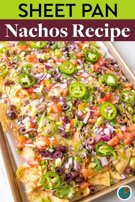 A colorful sheet pan of loaded nachos topped with cheese, jalapeños, tomatoes, onions, olives, and fresh herbs, ready to serve as an easy dinner or party appetizer. Sheet Pan Nachos Recipe, Nacho Night, Ground Beef Nachos, Sheet Pan Nachos, Pan Nachos, Easy Main Dishes, Loaded Nachos, Favorite Dinner, Nachos Beef