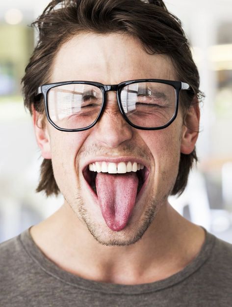 Man with glasses with his tongue out Mouth Anatomy, Human Tongue, Sticking Tongue Out, Tongue Health, Brush Your Teeth, Tongue Tie, Healthy Lifestyle Habits, Lifestyle Habits, Hereford