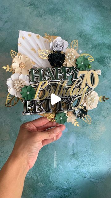 28K views · 3.1K likes | Roisin | Cricut UK Community Leader | Paper Crafter | Tutorials on Instagram: "70th Birthday Flower Palm Cake Topper 💚  So sorry I have been MIA for the last week it's been a pretty stressful one. Thank you to everyone who has sent me messages to check in on me. My dad has been in the hospital, he is back home now but needs a lot of support daily. On top of that Eve dropped my phone in the loo and it's totally gone. Got locked out of my apple account for 5 days trying to use a temporary phone and just got my apps back yesterday.  I made this cake topper for a special family friend and despite everything going on I really wanted to make it. Not just to avoid letting anyone down but because crafting is my therapy.  Going forward I will need prioritise my dad, family 70 Cake Birthday, 70th Cake Topper, Cricut Cake Topper, 70th Birthday Cake Topper, Cricut Cake, 70th Birthday Cake, 85th Birthday, Diy Cake Topper, Birthday Flower