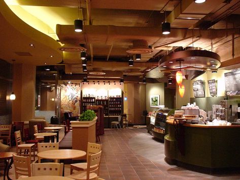 Can Starbucks Make 23,000 Coffee Shops Feel Unique? Starbucks Interior, Village Coffee, Aesthetic 2000s, Coffee Shop Interior Design, Coffee Varieties, Coffee Shop Aesthetic, Coffee Shops Interior, Co Design, Shop Interior Design